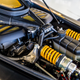 One very large twin-turbo Mercedes V12, perfectly color-coordinated with the rest of the suspension and engine bay because they can.